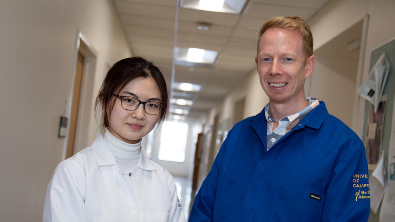Baskin Research Award Winner Wenzhe Li stands with Assistant Professor Richard McKenney, Department of Molecular and Cellular Bi