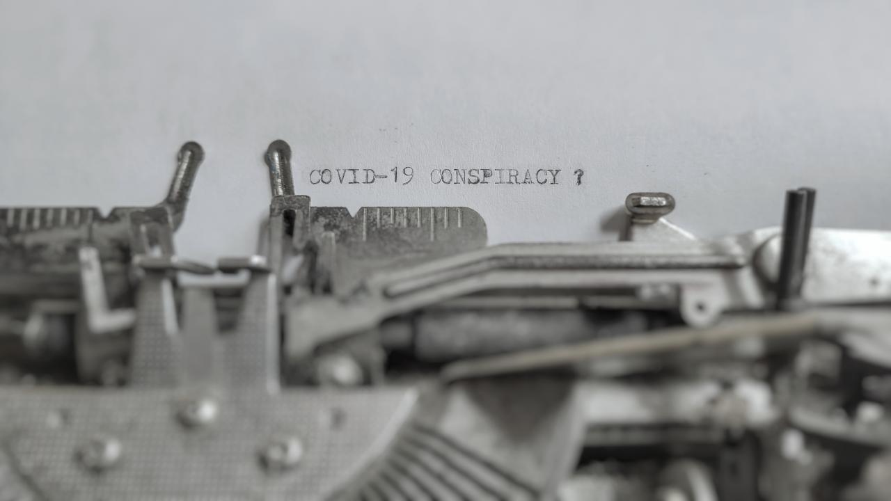 Typewriter with conspiracy theory