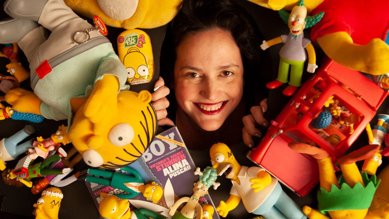 Karma Waltonen, surrounded by "The Simpsons" memorabilia