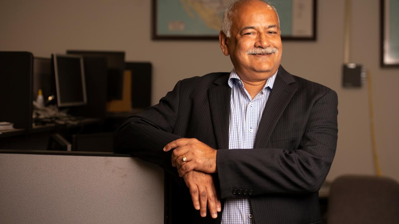 Professor Biswanath Mukherjee, environmental portrait