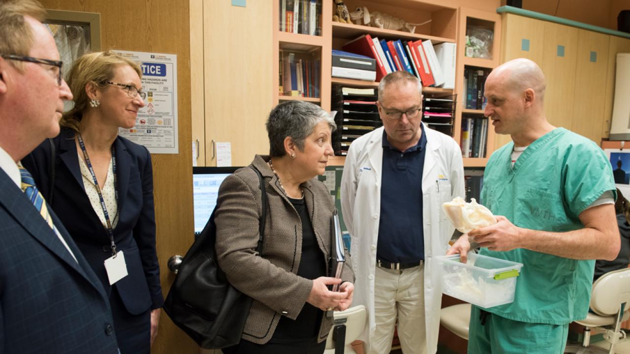 Boaz Arzi shows UC President Janet Napolitano a 3-D printed skull.