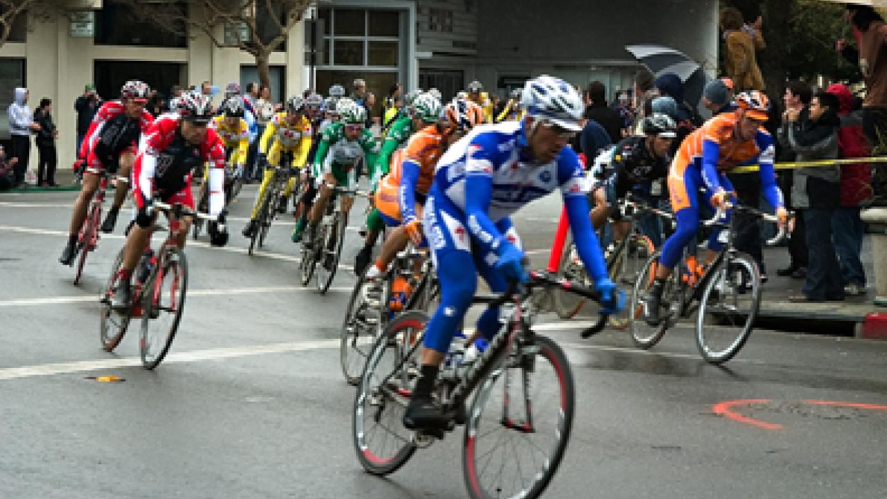 The Amgen Tour of California peloton speeds through downtown Davis last year, en route to Sacramento.