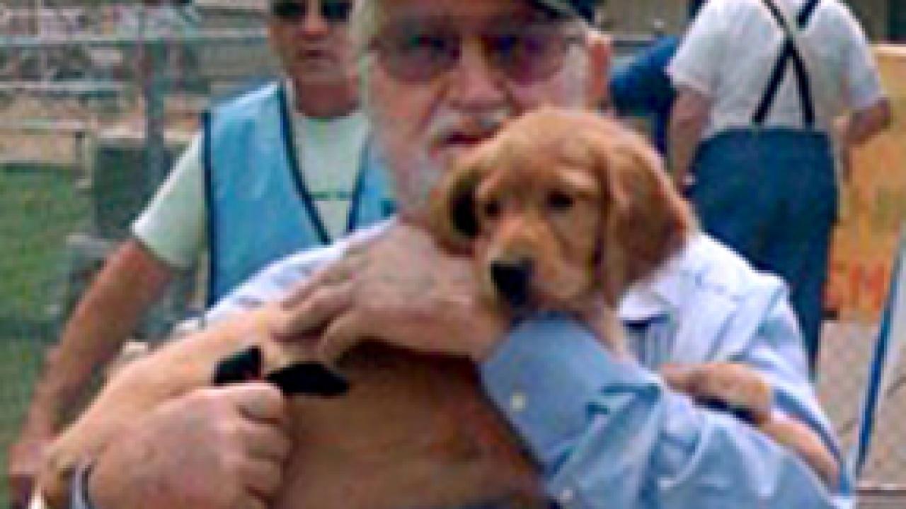Unidentified man and his golden retriever puppy leave Butte County shelter June 29, headed home to Concow north of Oroville.