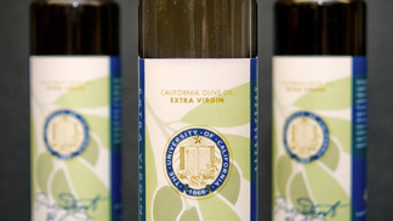 Photo: Three bottles of UC Davis' President's Blend olive oil