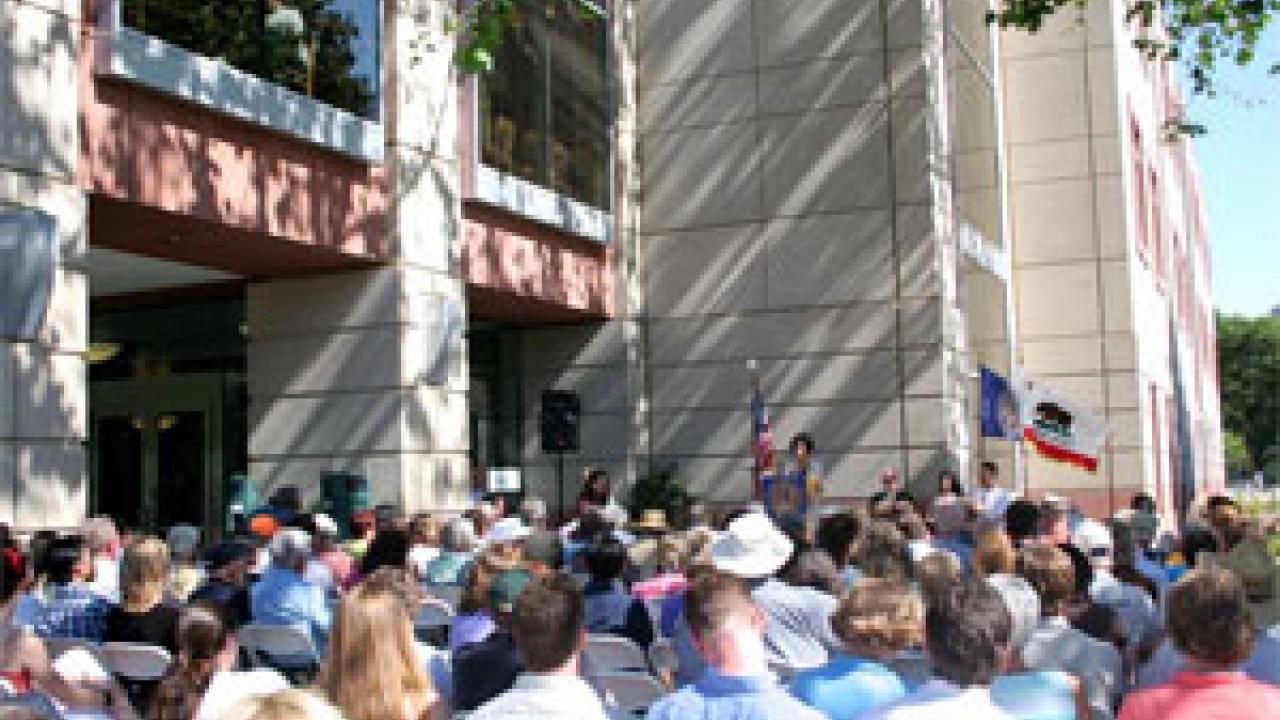 Below, speakers at the June 3 dedication ceremony included Dean Phyllis Wise.