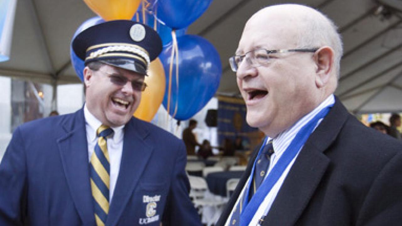 Photo: UC President Mark G. Yudof and Tom Slabaugh, director of the California Aggie Marching Band-uh!