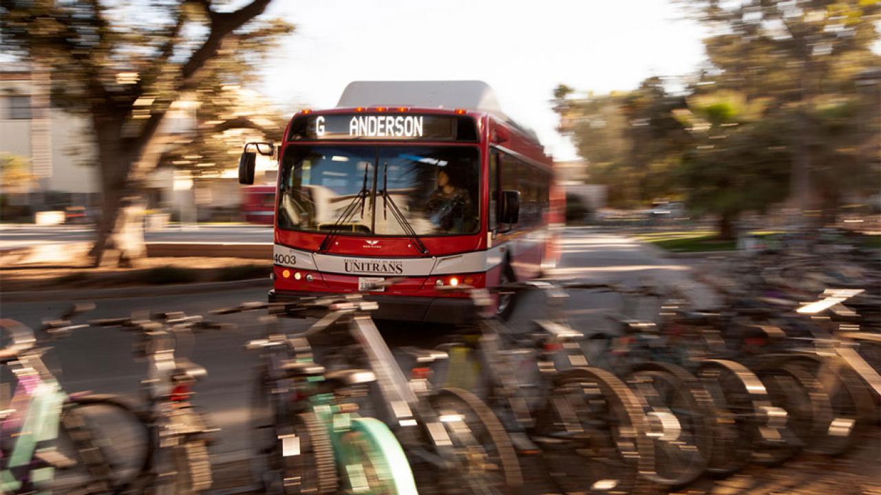 Unitrans bus, with parked bicycles in foreground