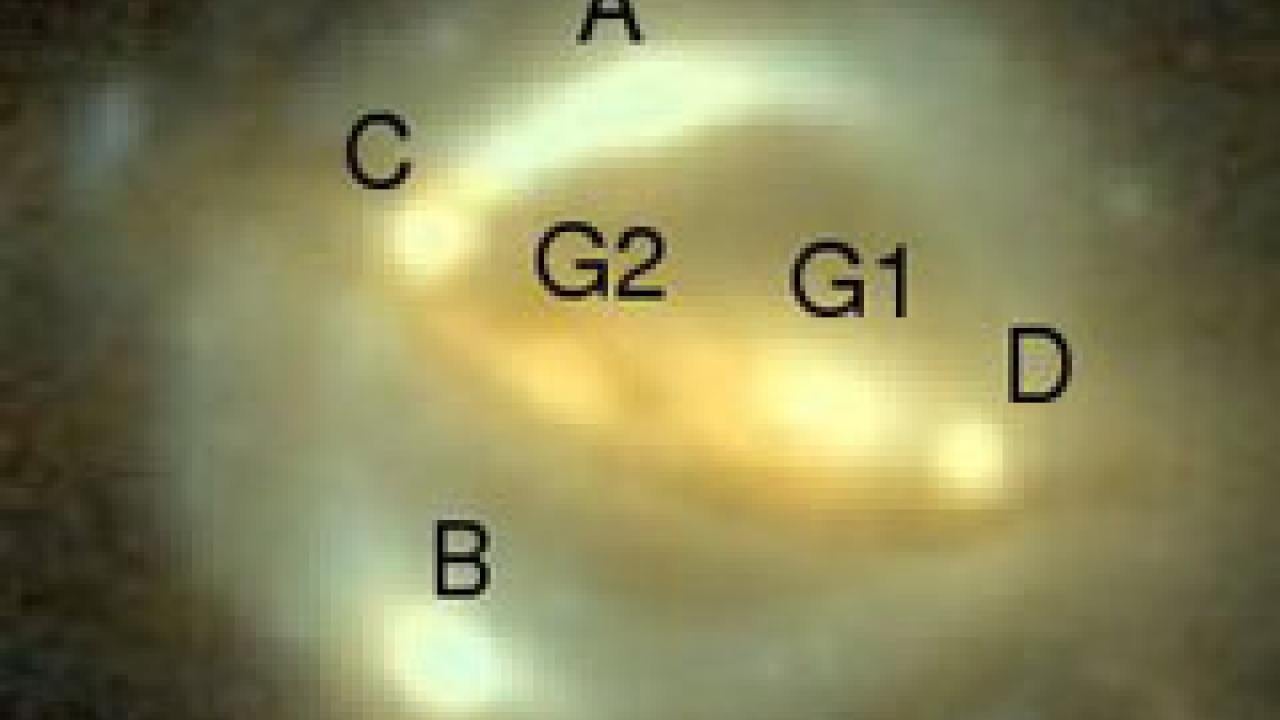 Photo: gravitational lens showing two gallaxies