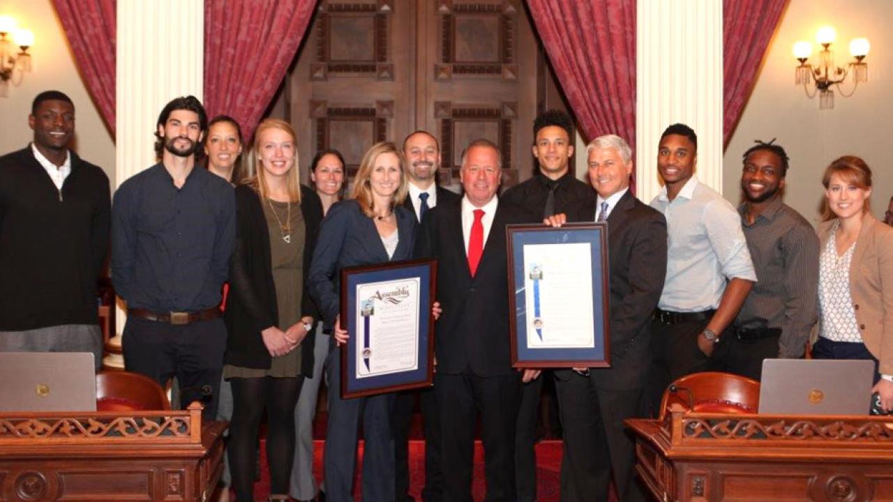 Basketball players with state senators.