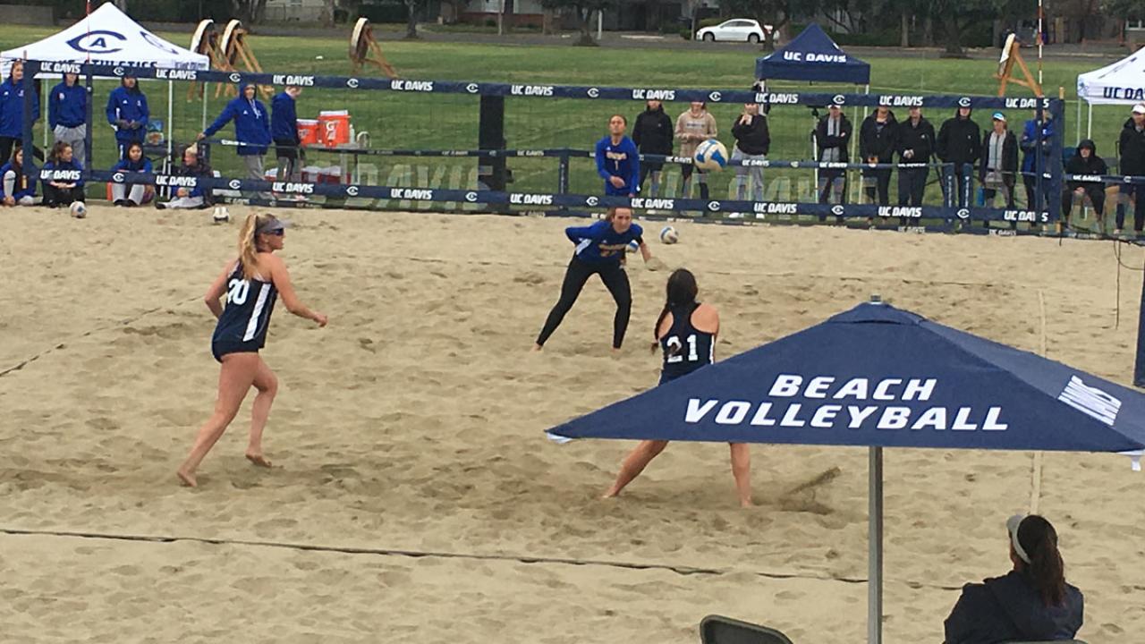 Women's beach volleyball, in action.