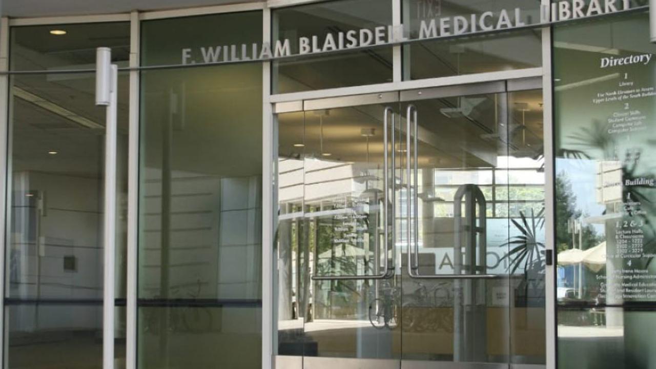 "F. William Blaisdell Medical Library" sign above glass entry doors