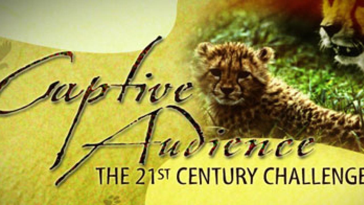 Graphic: Designed picture with infant cheetah, adult cat and words that say Captive Audience: The 21st Century Challenge