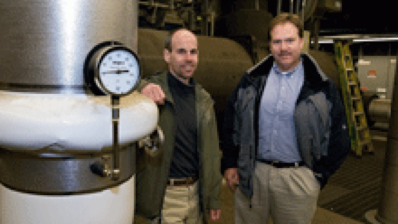 Come summer, UC Davis can thank utilities associate director Chris Cioni, left, and project manager Scott Arntzen for making quick work of an upgrade to the campus&rsquo;s cooling system. New, energy-saving chillers earned a $1.25 million PG&E rebat