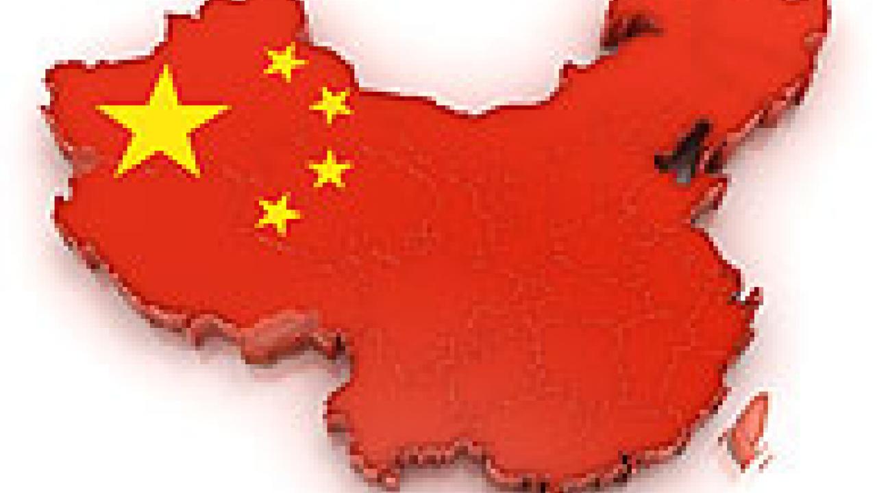 Graphic: Map of China with red national flag over it