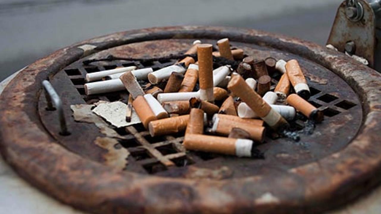 Outdoor cigarette ashtray