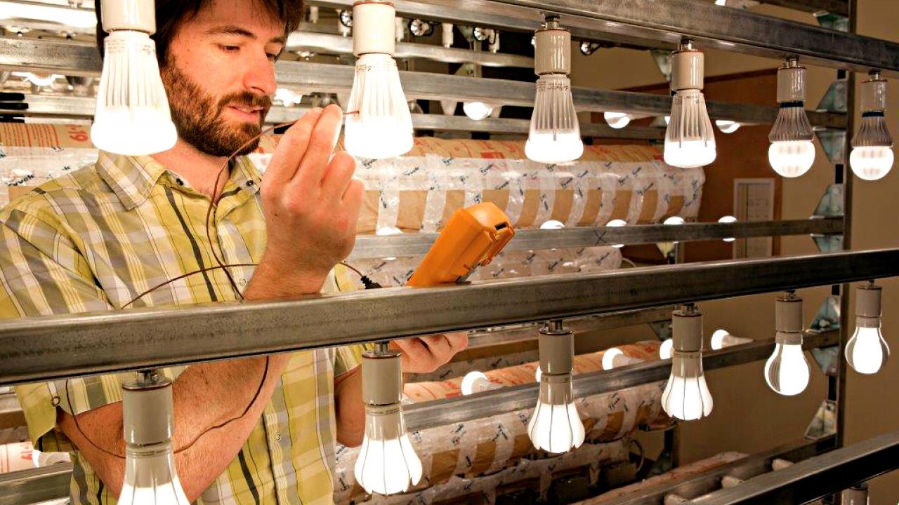 Researcher tests light bulbs