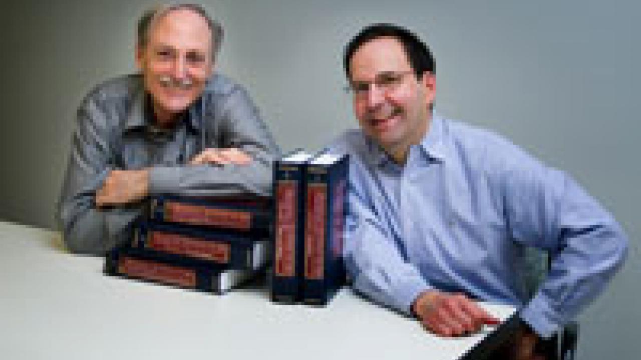 Alan Olmstead, left, and Scott Gartner are two UC Davis authors of a five-volume, 4,000-page reference book on U.S. economic statistics. The latest edition project began in 1993 with an effort to digitize the 1976 version on a CD.