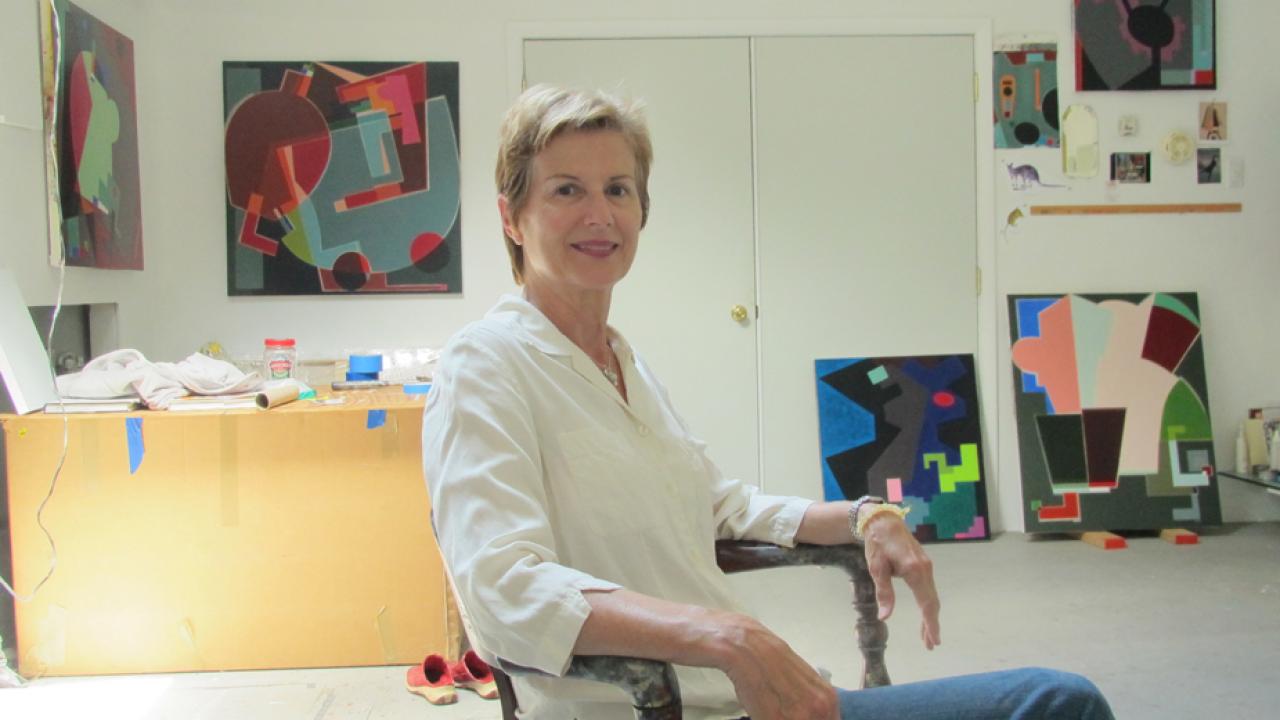 Photo: Laurie Fendrich, seated, in art studio.