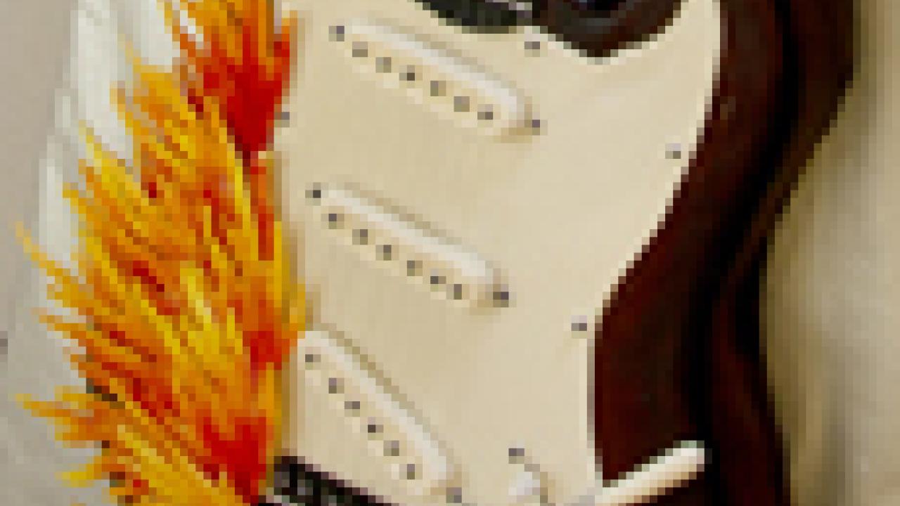 Photo: "Flaming" guitar cake (cropped)
