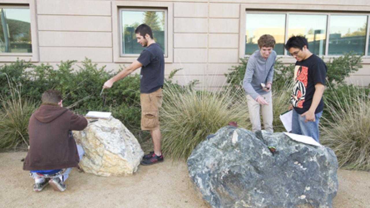 Photo: Geology 101 students in the Geology GATEway Garden