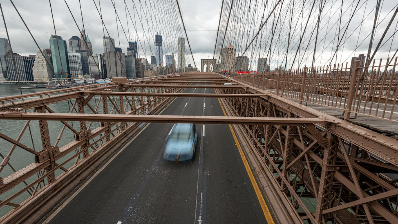 One car drives across Brooklyn Bridge in New York during Spring 2020's shelter-in-place directives.