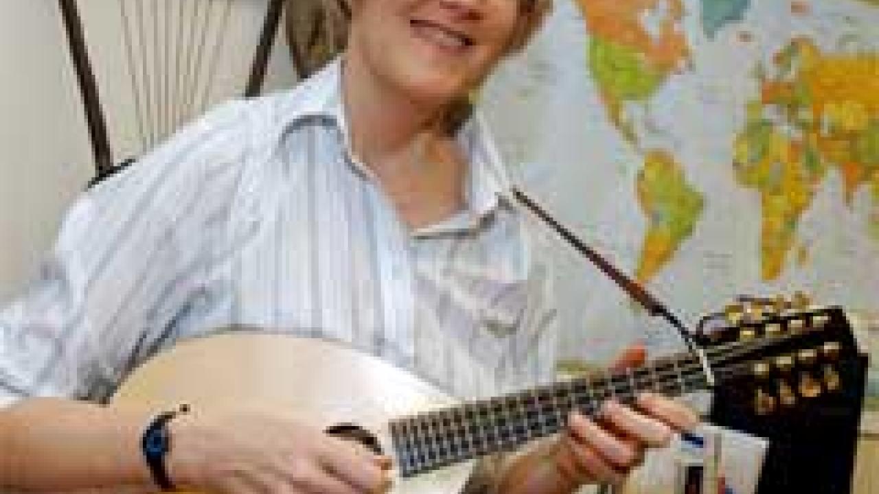 Photo: woman with mandolin