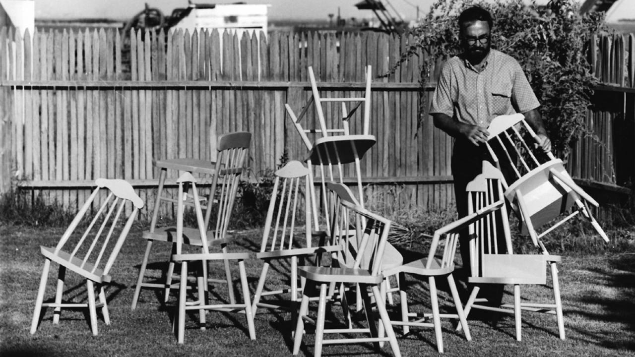 Photo: Ralph Johnson stages his artistic chairs.