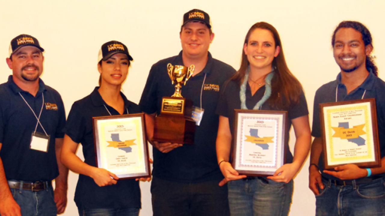 Photo: Meat Lab champs Caleb Sehnert, Cindy Garcia, Kyle Anderson, Kristina Rothery, Antonio Beltran, with plaques and the Norm Eggen Championship Cup