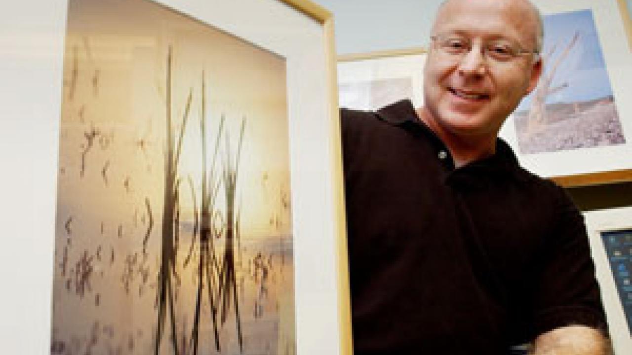 Land, Air and Water Resources professor Terry Nathan shows off some of his abstract nature photography.  