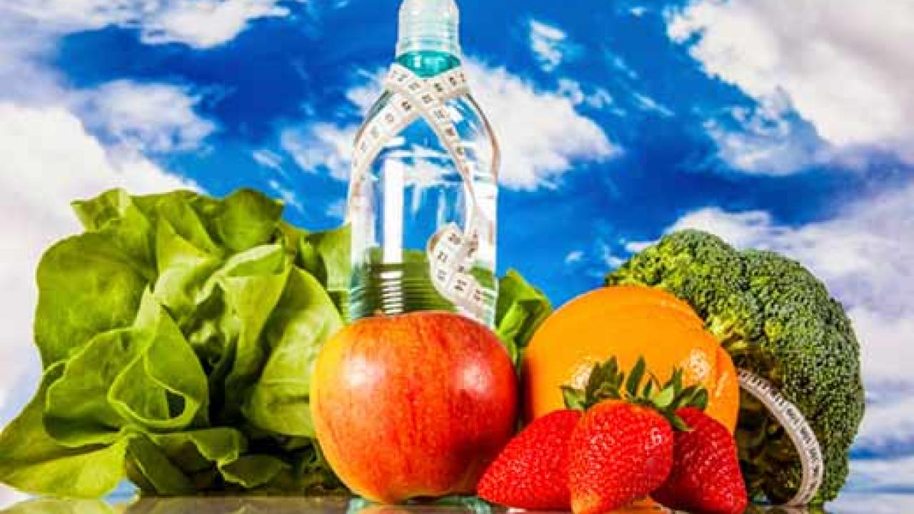 Vegetables, fruit and a bottle of water