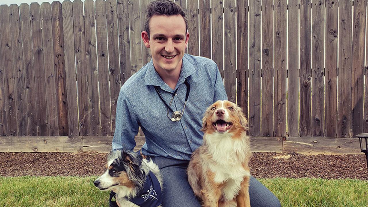 Vet school student Ricky Walther with his dogs