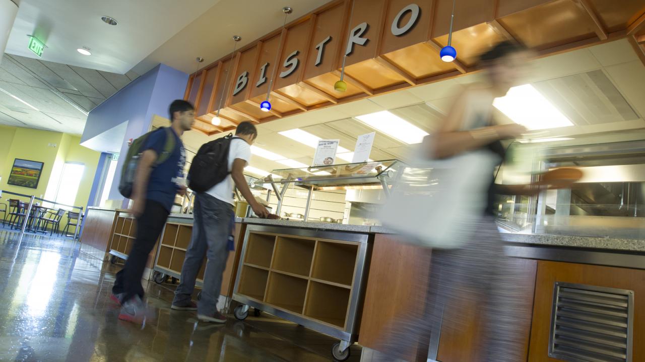 Students pick up food at the Bistro in the Segundo Dining Commons. 