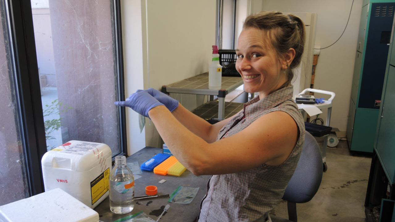 Photo: Smiling Sharon Gray in lab.