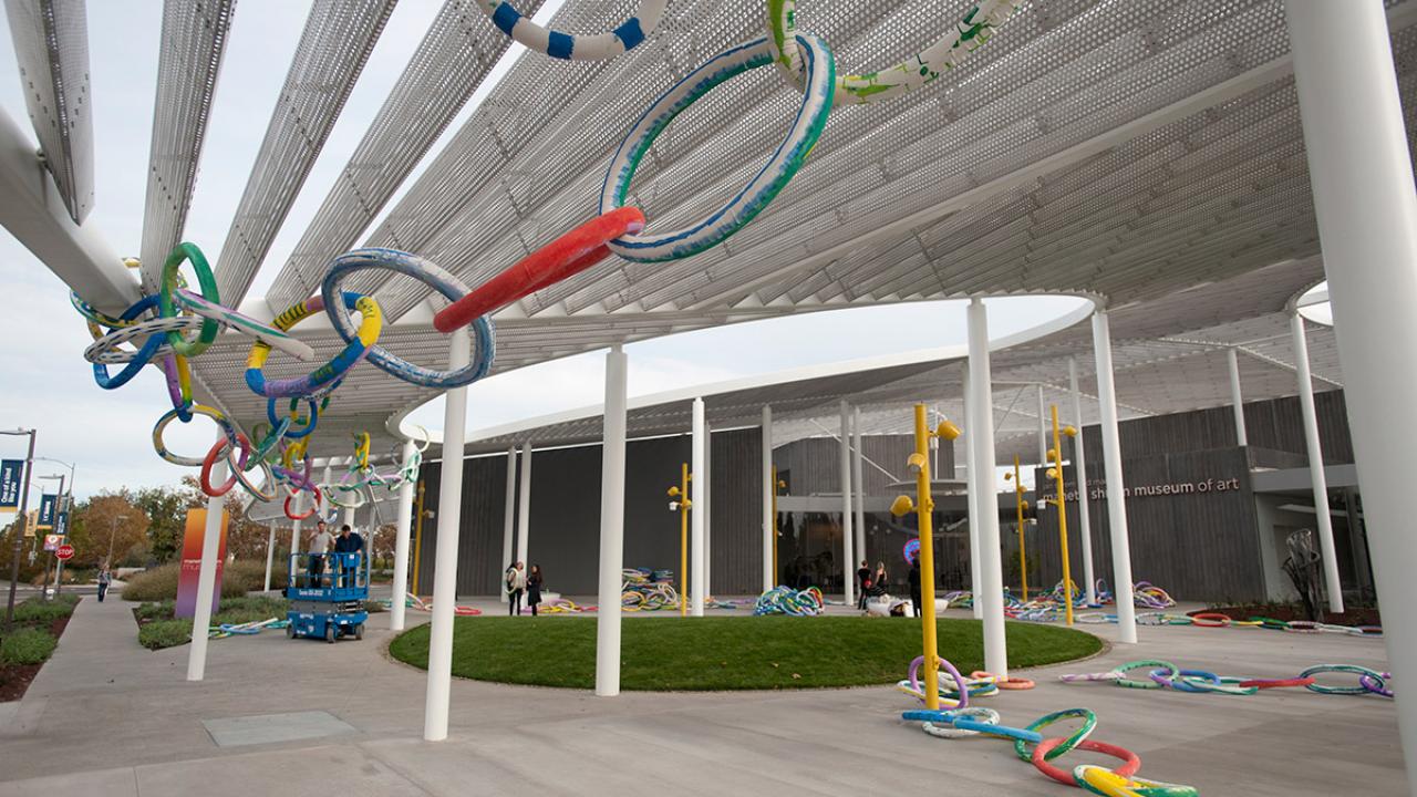 The Jan Shrem and Maria Manetti Shrem Museum of Art is adorned with a ribbon.