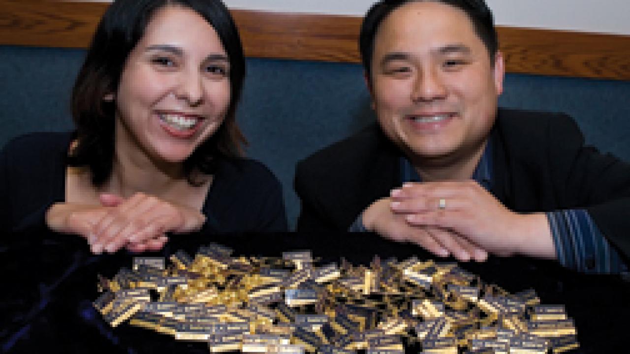 Staff Assembly's Jennifer Lucero and Lin King want to pin fellow employees.
