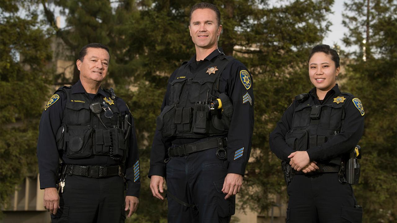 Three police officers.