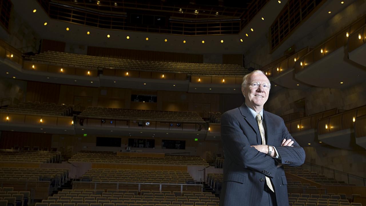 Photo: Portrait of Larry N. Vanderhoef, along in the audience section of the Mondavi Center for the Performing Arts