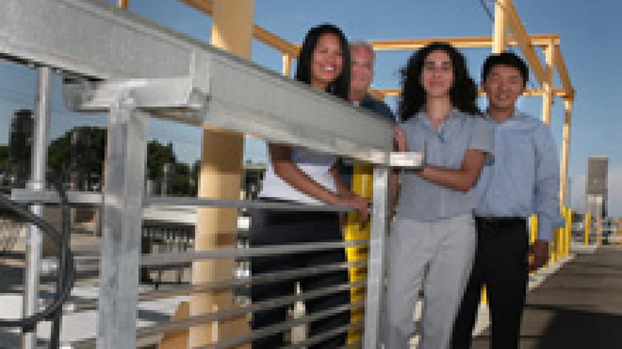 From left: Mananya Chansanchai, Bassam Younis, Elisabetta Lambertini, James Bui, at the UC Davis wastewater treatment facility, the subject of their winning business plan.