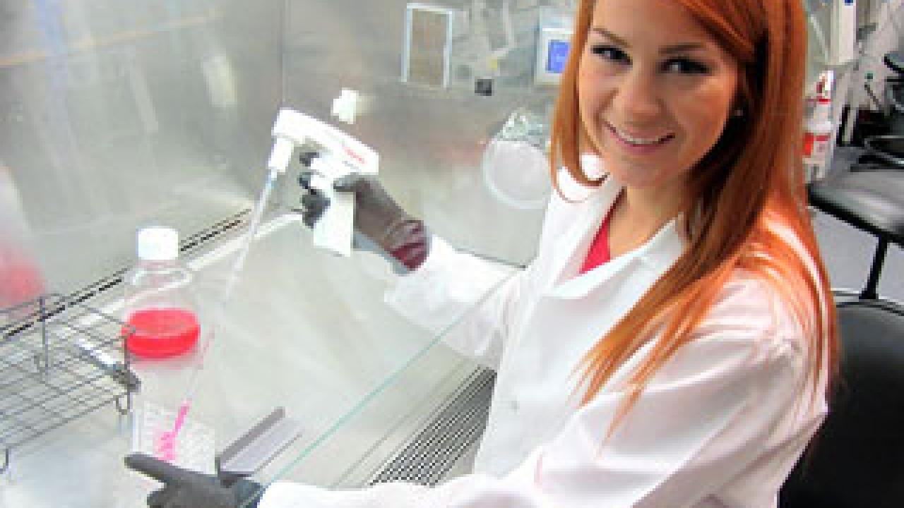 Woman in a lab with instruments
