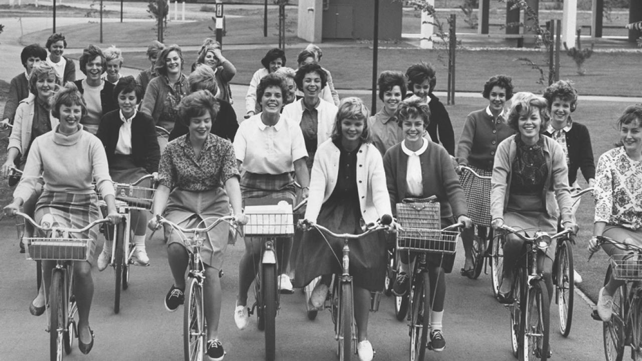 Women on bikes, 1962, black-and-white photo