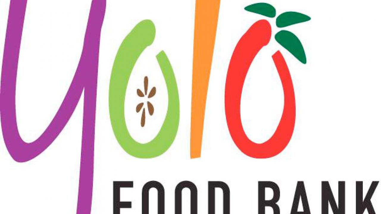 Graphic: Yolo Food Bank logo, featuring a carrot for the "l" and a tomato for one of the "o's" (cropped)