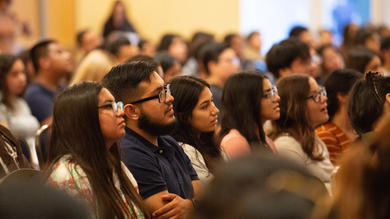 Chicanx and Latinx students sit down together at the Chicanx and Latinx Fall Welcome Event