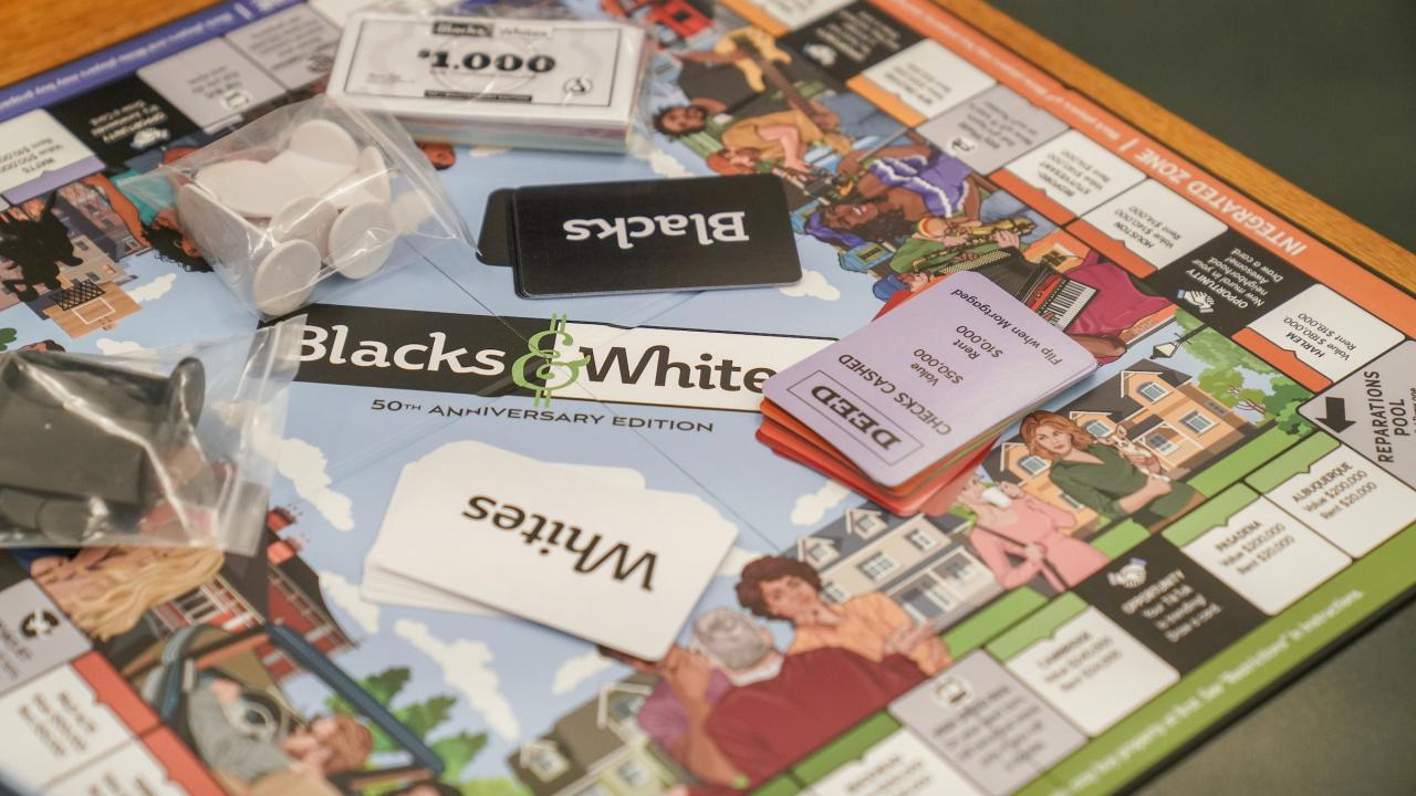 A close up of the 2021 version of Blacks & Whites board game