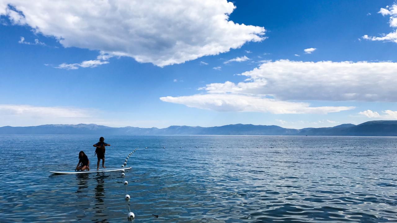 Children on paddle board in Lake Tahoe 