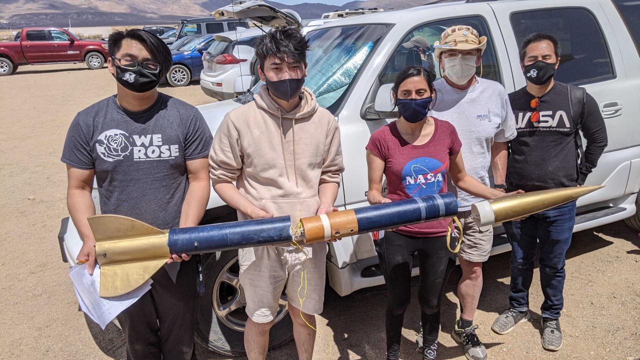 Members of the UC Davis FIRST Nations Launch team with their rocket. 