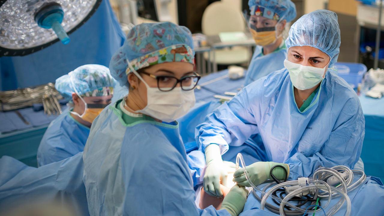 Doctors preforming surgery