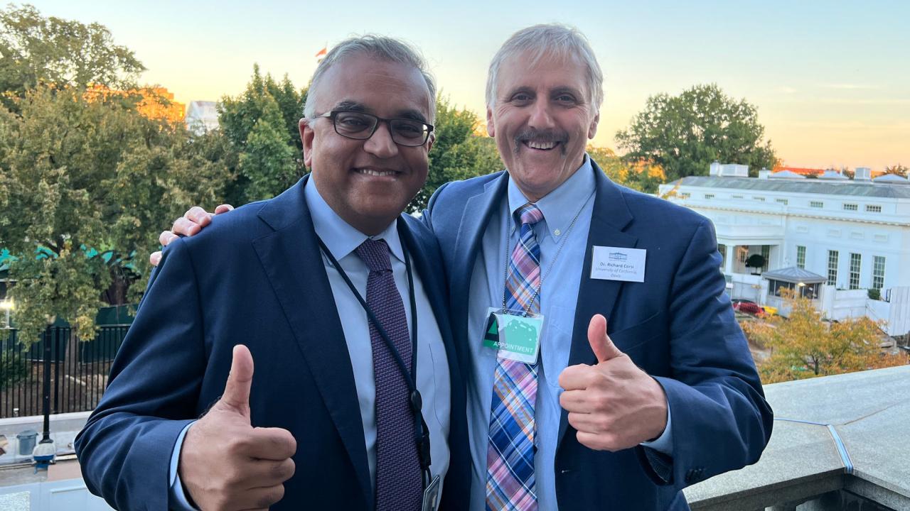 Ashish Jha, White House official, and Richard Corsi, UC Davis faculty, both giving thumbs-up outside the White House