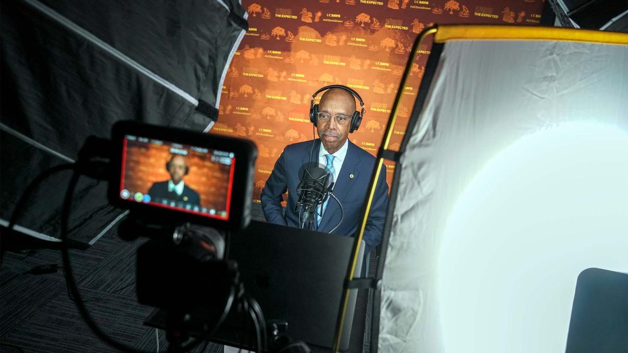 President Michael V. Drake sits in a recording studio