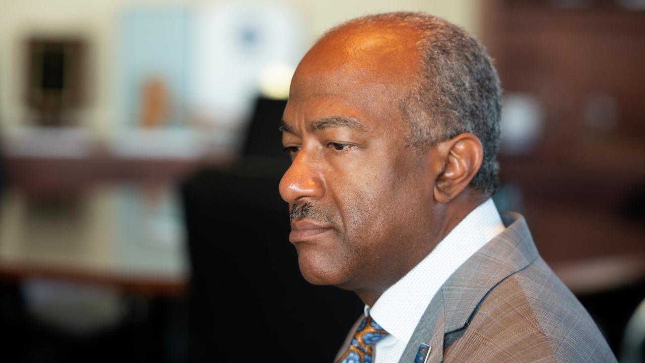 Chancellor Gary S. May, serious, portrait, profile