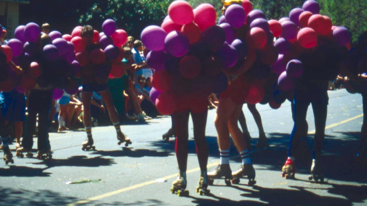 Skaters with balloons